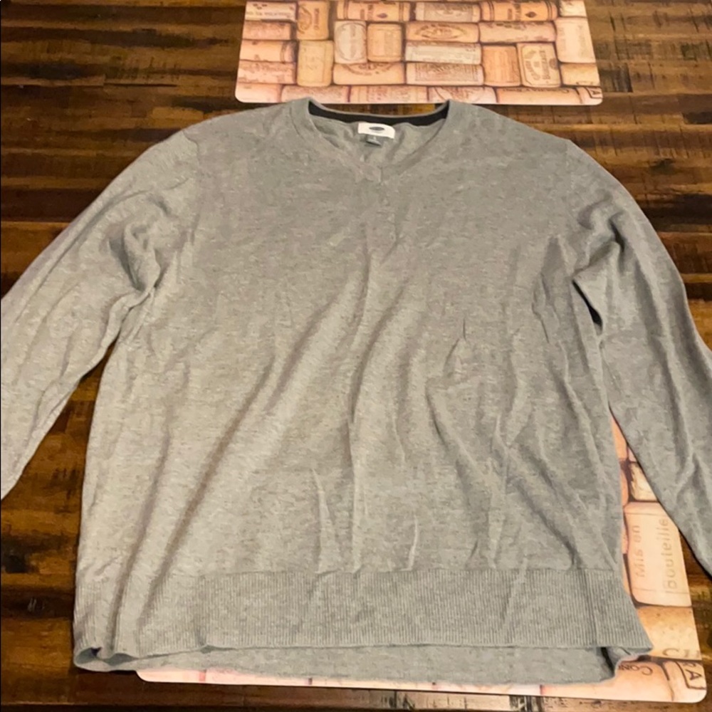 Men’s large V neck sweater.